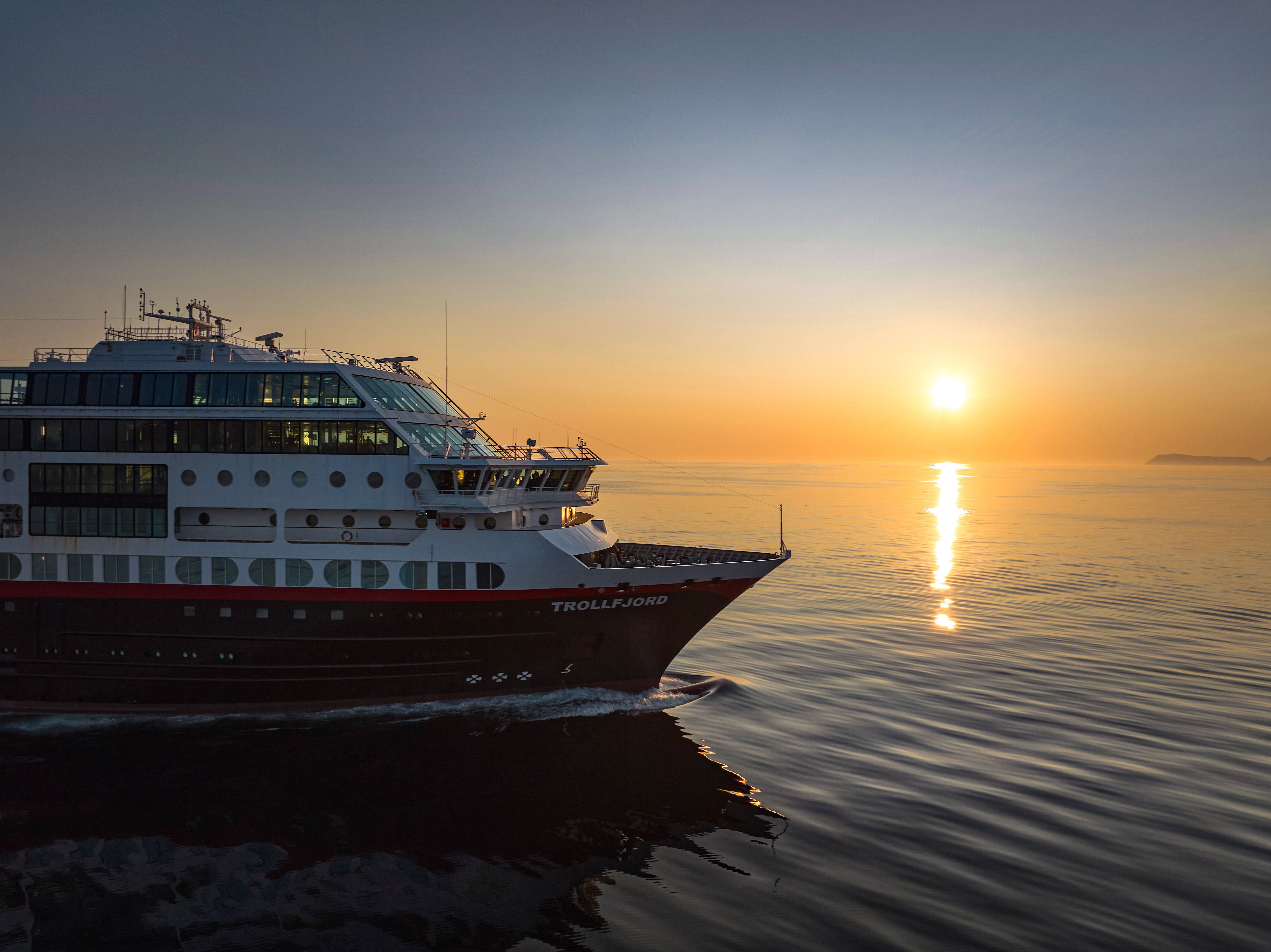 Cruise in Norway, Svalbard with the sunset behind it