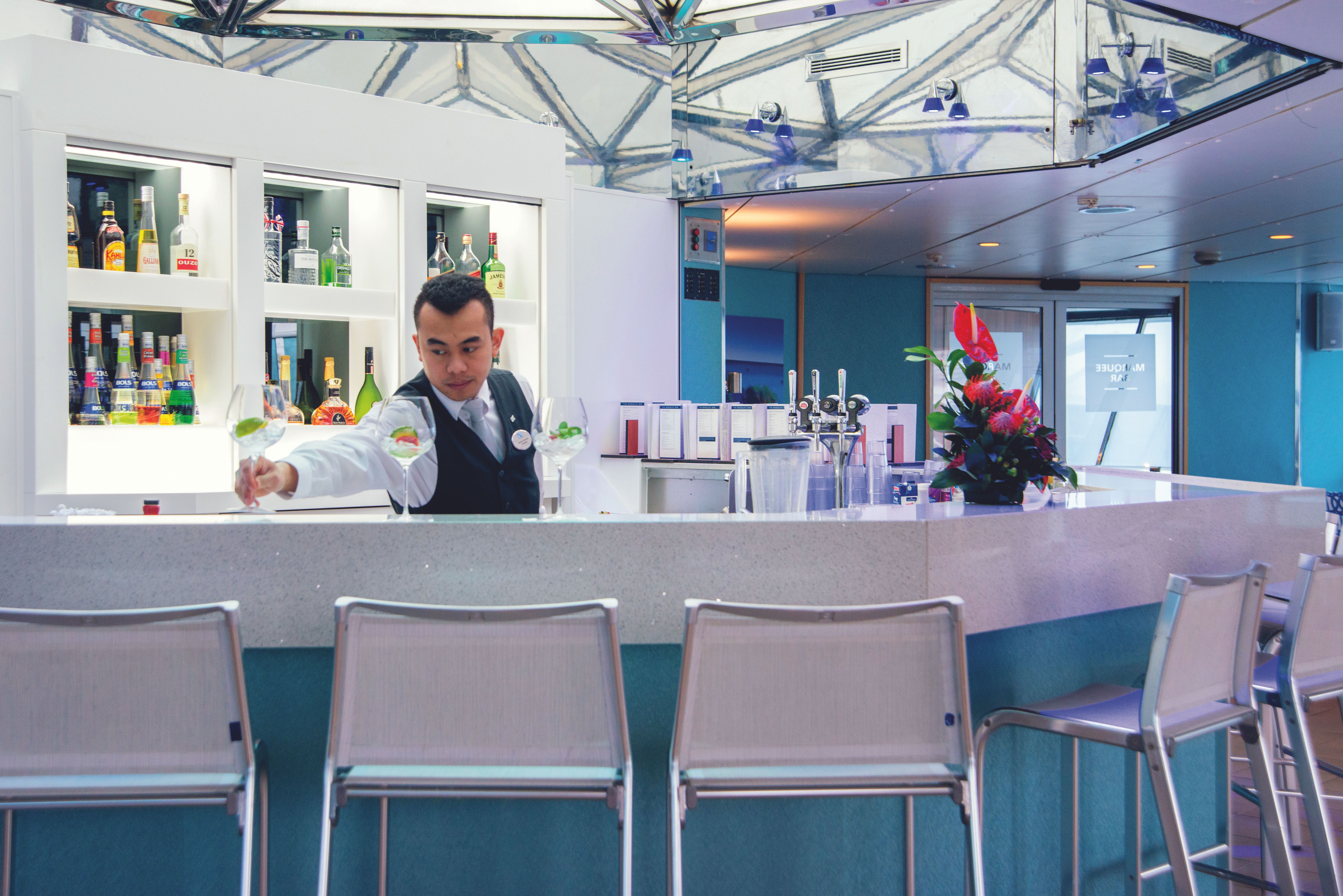 Waiter serving drinks in the Marquee Bar.jpg