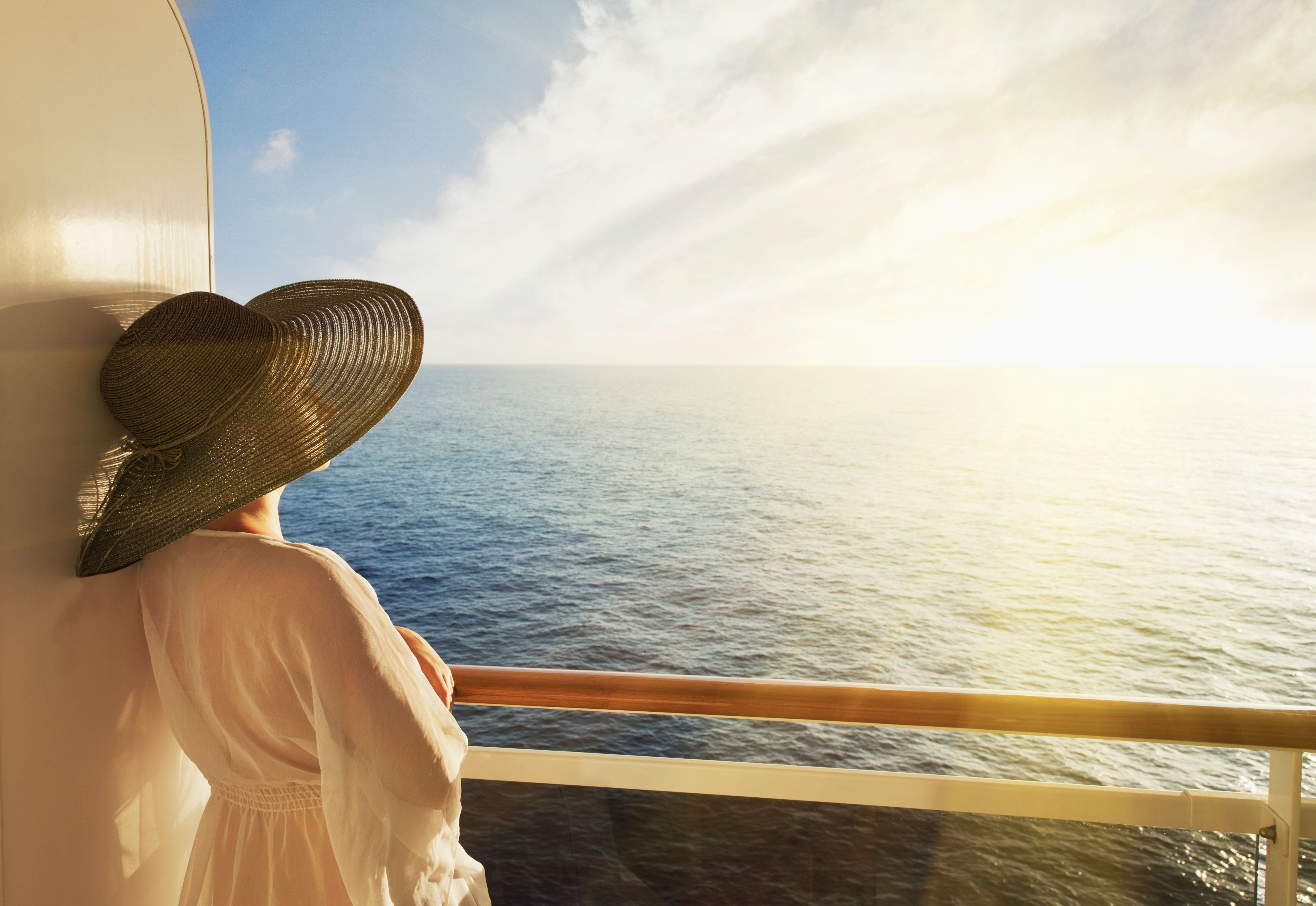 Woman looking out to sea on a cruise ship